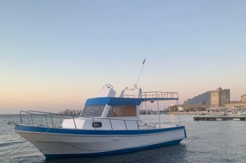 Escursioni Riserva dello Zingaro e Scopello in una tipica barca dei pescatori